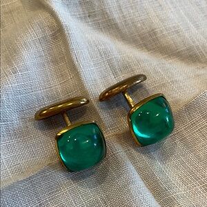 Elegant Gold tone cufflinks with green stone